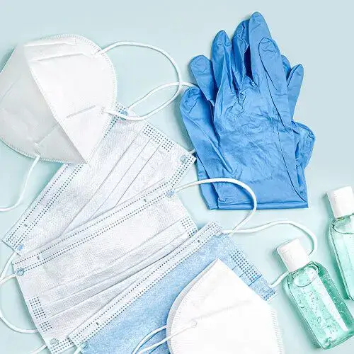 Hygienematerial für Bestatter, inklusive Desinfektion, Einweghandschuhe und Schutzkittel.