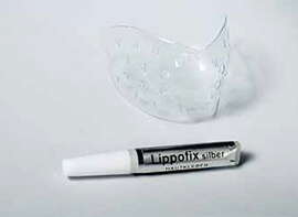 Lippenkleber und transparenter Mundformer mit Noppen, anatomisch und transparent.